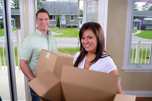 Reliable removal company in Bromley loading items carefully