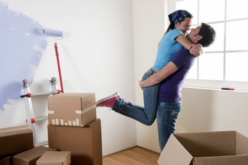 House removals planning in Bromley with packed moving boxes