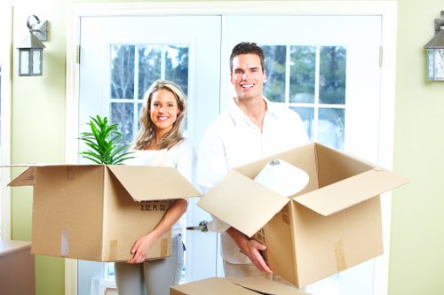 Business relocation team transporting office furniture