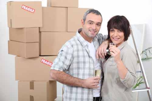 A specialist team managing piano transport through a Bromley property